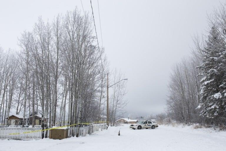 <p>RCMP remain on scene of the house where the bodies of two brothers were found after a shooting last Friday in La Loche, SK. (Photograph by Chris Bolin)</p>
