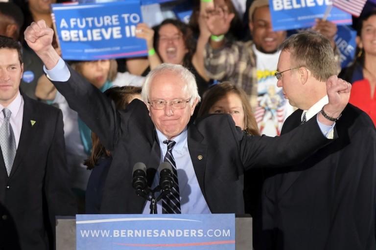<p>Democratic presidential candidate, Sen. Bernie Sanders, I-Vt., reacts to the cheering crowd at his primary night rally Tuesday, Feb. 9, 2016, in Manchester, N.H. (AP Photo/J. David Ake)</p>
