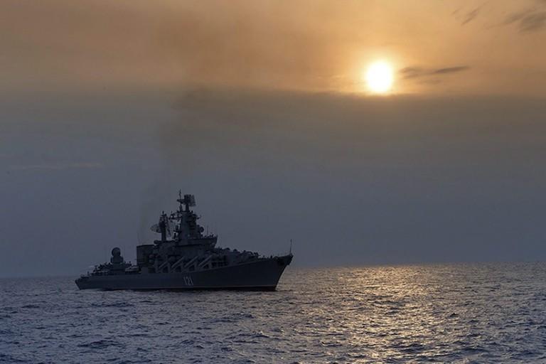 <p>This photo taken on Thursday, Dec. 17, 2015 and provided by the Russian Defense Ministry Press Service, shows the Russian missile cruiser Moskva on patrol in the Mediterranean Sea near the Syrian coast. The Russian military has deployed the Moskva closer to the shore to help protect Russian warplanes with its air defense missiles following the downing of a Russian bomber by Turkey at the border with Syria. (Vadim Savitsky/Russian Defense Ministry Press Service via AP)</p>
