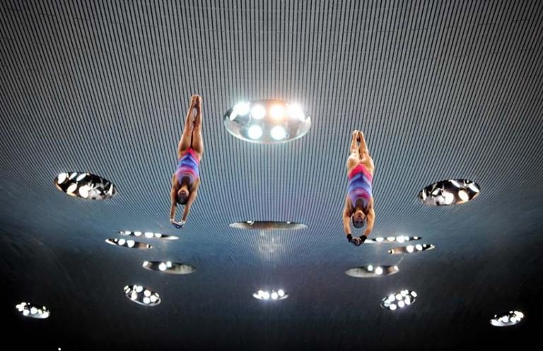 <p>My Phan (L) and Maria Kurjo of Germany warm up for the Womens Diving Synchronised Platform Final on Day Two of the LEN European Swimming Championships at the Aquatics Centre on May 10, 2016 in London, England.  (Dan Mullan/Getty Images)</p>

