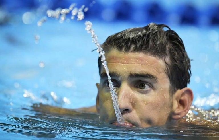 <p>He&#8217;s back<br />
Michael Phelps spits water after swimming in the men&#8217;s 200-meter individual medley preliminaries at the U.S. Olympic swimming trials, Thursday, June 30, 2016, in Omaha, Neb. (Mark J. Terrill/AP)</p>
