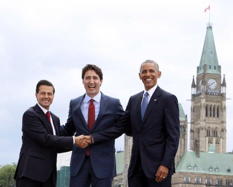 <p>Prime Minister Justin Trudeau (centre), Mexican President Enrique Pena Nieto(left) and U.S. President Barack Obama(right) take part in a family photo at the North American Leaders&#8217; Summit in Ottawa, Wednesday June 29, 2016. (Fred Chartrand/CP)</p>

