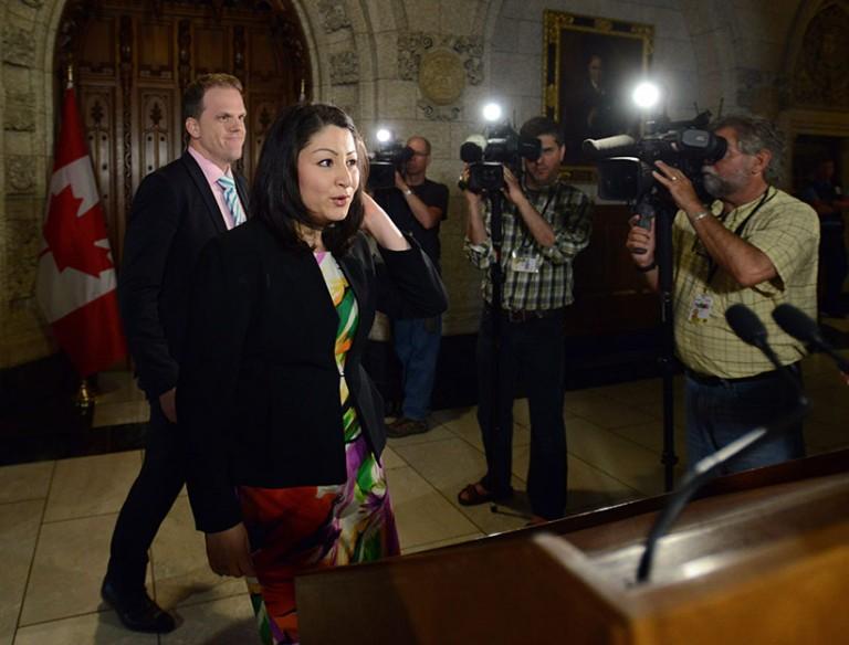 <p>Minister of Democratic Institutions Maryam Monsef is joined by fellow MP Mark Holland, left, as they arrive to speak to reporters in the foyer of the house of commons on Parliament Hill in Ottawa on Thursday, June 2, 2016. (Sean Kilpatrick/CP)</p>
