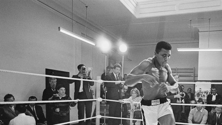 <p>American heavyweight boxer Muhammad Ali throws bare-handed punches in the ring while in training for his fight against Brian London, London, England, August 1966. (R. McPhedran/Hulton Archives/Getty Images)</p>
