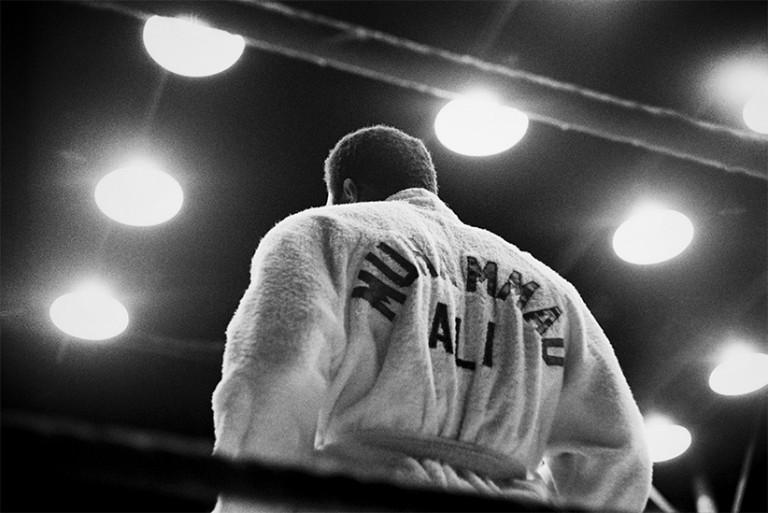 <p>Rear view of American boxer Muhammad Ali, wearing a robe in the boxing ring, San Juan, Puerto Rico.  (Brian Hamill/Getty Images)</p>
