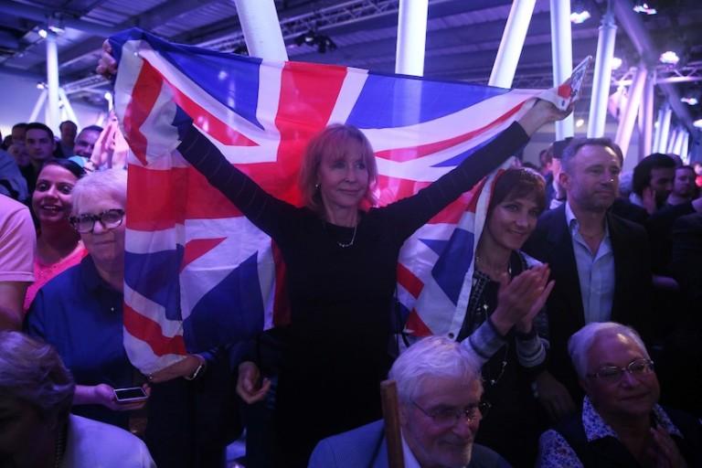 <p>A Brexit supporter holds a Union Flag at a Vote Leave rally in London, Britain June 4, 2016. (Neil Hall/Reuters)</p>
