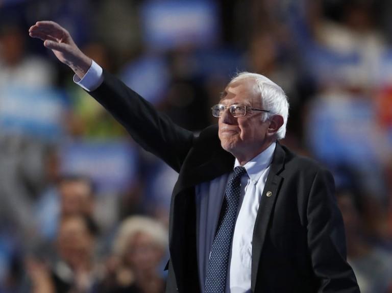 <p>Former Democratic Presidential candidate, Sen. Bernie Sanders, I-Vt., takes the stage during the first day of the Democratic National Convention in Philadelphia , Monday, July 25, 2016. (AP Photo/Paul Sancya)</p>
