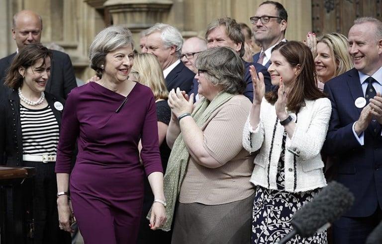 <p>Conservative Party leadership candidate and current home secretary Theresa May is joined by supporting MPs as she speaks outside Parliament (Peter MacDiarmid/REX/Shutterstock/CP)</p>
