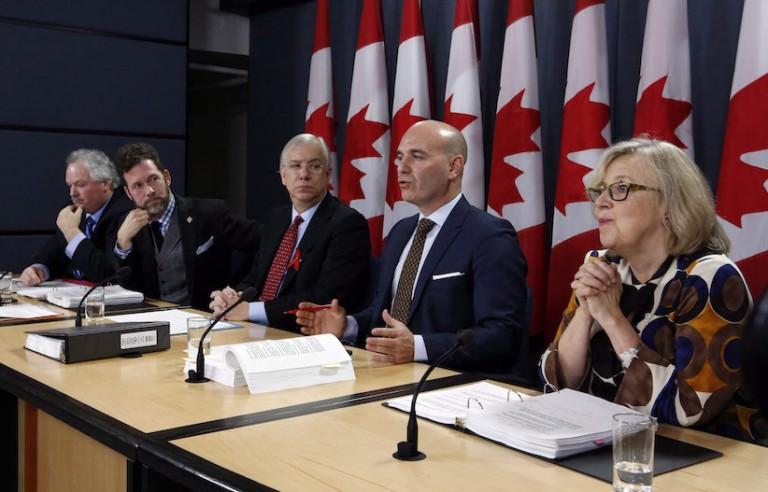 <p>Members of the House of Commons special committe on electoral reform Luc Therault Bloc Quebecois, left to right, Scott Reid Conservative Party, Francis Scarpaleggia Liberal Party, Nathan Cullen NDP, and Elizabeth May Green Party hold a news conference in Ottawa, Thursday, Decemeber 1, 2016. A special all-party committee is recommending that the Trudeau government design a new proportional voting system and hold a national referendum to gauge how much Canadians would support it. THE CANADIAN PRESS/Fred Chartrand</p>
