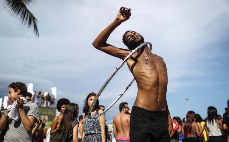 <p>Revelers celebrate during the annual gay pride parade on Copacabana beach December 11, 2016 in Rio de Janeiro, Brazil. (Mario Tama/Getty Images)</p>
