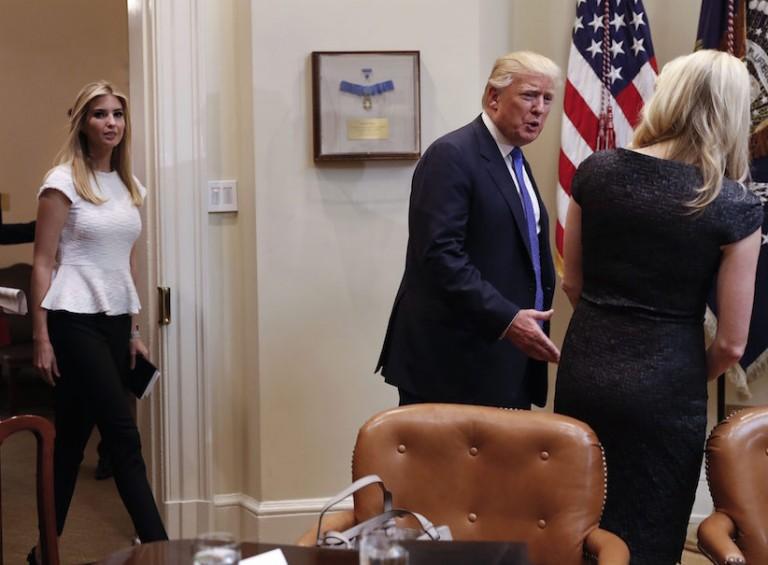 <p>President Donald Trump talks with Kristen Short, as his daughter Ivanka Trump, left, arrives for a meeting on domestic and international human trafficking, Thursday, Feb. 23, 2017, in the Roosevelt Room of the White House in Washington. (AP Photo/Pablo Martinez Monsivais)</p>
