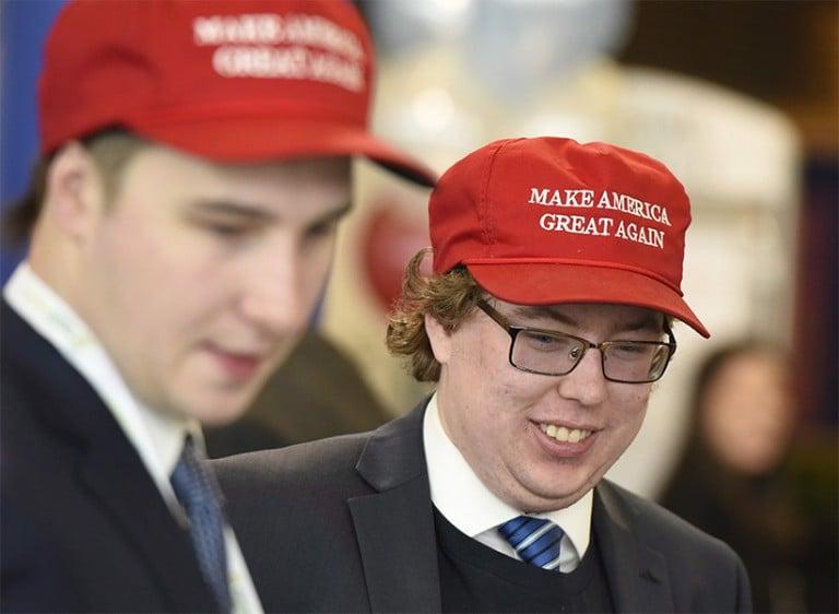 <p>Alex Walsh, right, and Matt Atkins wear Make America Great Again hats as they attend the Manning Centre conference on Friday, Feb. 24, 2017 in Ottawa. (Justin Tang/CP)</p>
