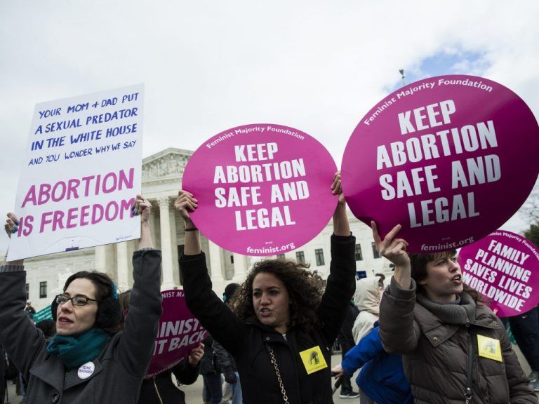 Pro-Choice supporters try to block Pro-Life demonstrators in front of the Supreme Court during the annual March for Life on the anniversary of the historic Roe v. Wade Supreme Court ruling in Washington, USA on January 27, 2017. Photo, Samuel Corum/Anadolu Agency/Getty Images.