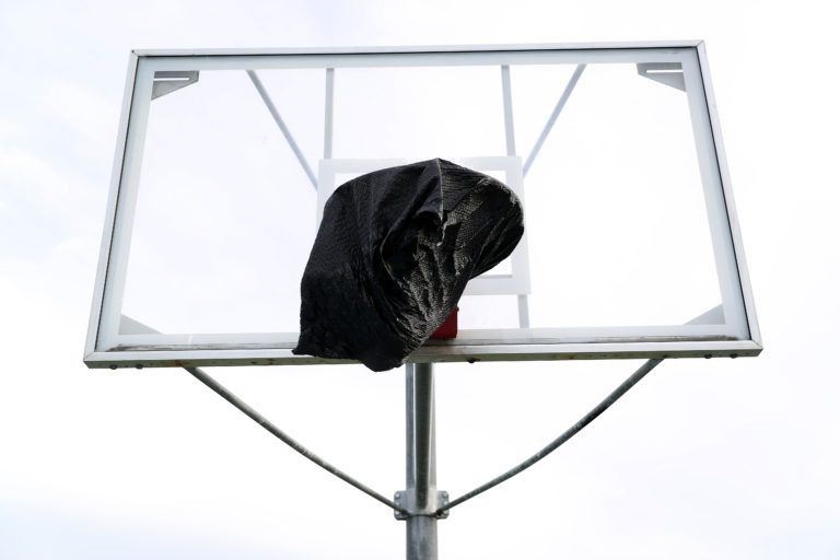 The basketball hoops in California are covered up with a tarp to prevent people from gathering and playing basketball on Mar. 31, 2020 out of the concern of COVID-19. (Maxx Wolfson/Getty)