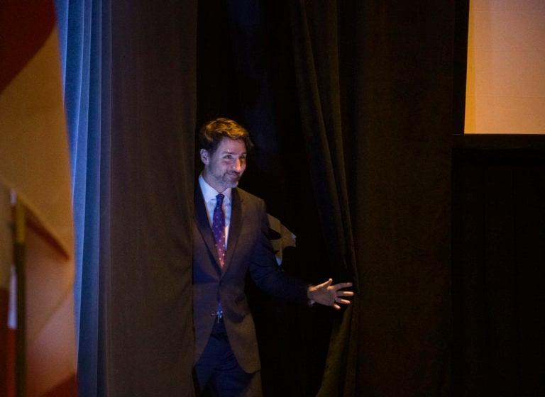 Trudeau heads to the podium during a function at the Prospectors and Developers Association of Canada convention on Mar 2 2020 (CP)