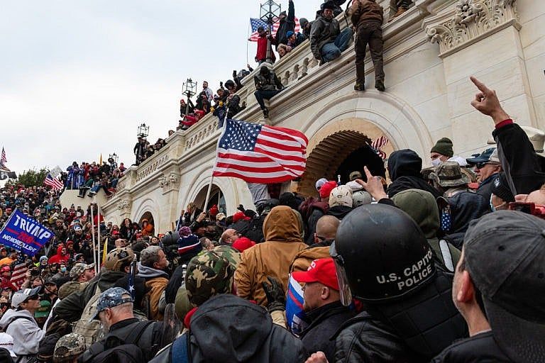 Demonstrators enter the U.S. Capitol building during a protest in Washington on Jan. 6, 2021 (Eric Lee/Bloomberg via Getty Images)