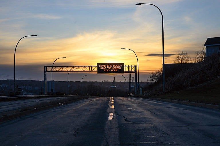A message board over a highway in Halifax on Tuesday, April 21, 2020. (Darren Calabrese)