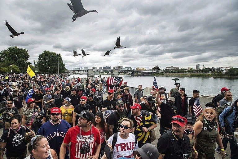 Members of the Proud Boys and other right-wing demonstrators during an "End Domestic Terrorism" rally in Portland, Ore., on Aug. 17, 2019 (Noah Berger/AP/CP)