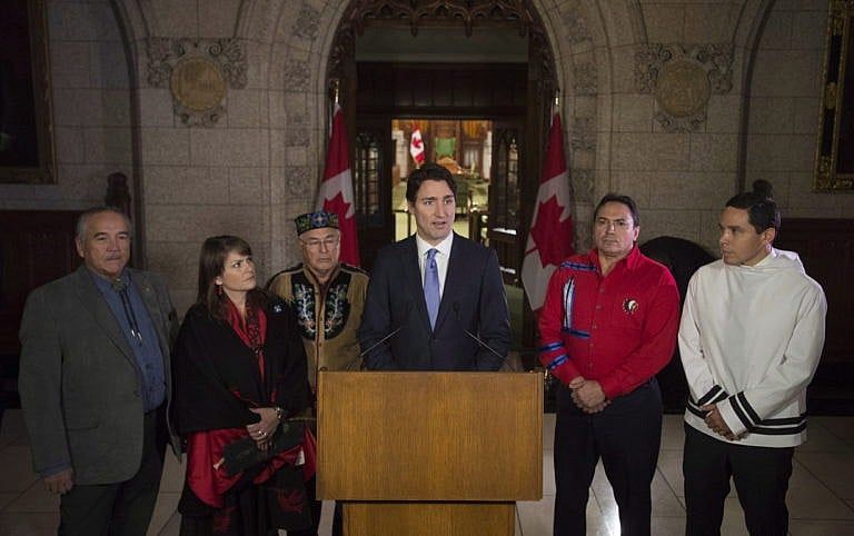 Trudeau speaks with national Indigenous leaders on Parliament Hill on Dec. 16, 2015 (Adrian Wyld/CP)
