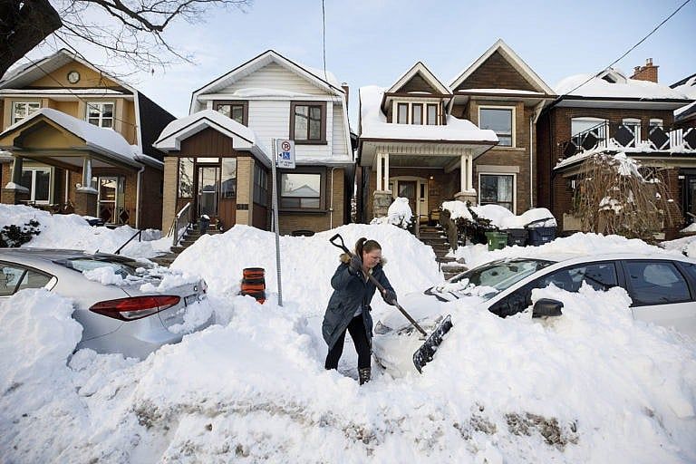 A local resident shovels snow after A local resident shovels snow after a snowstorm in Toronto, Ontario, Canada, on Tuesday, Jan. 18, 2022. Toronto Mayor John Tory declared a "major snowstorm condition" and said it would take at least 72 hours clear the city of snow. (Cole Burston/Bloomberg/Getty Images)a snowstorm in Toronto, Ontario, Canada, on Tuesday, Jan. 18, 2022. Toronto Mayor John Tory declared a "major snowstorm condition" and said it would take at least 72 hours clear the city of snow. Photographer: Cole Burston/Bloomberg via Getty Images