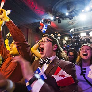 Parti Liberal Qu?b?cois (PLQ) supporters celebrate their party victory at the plaza theatre in Montreal April 7, 2014. Canada's Quebec province voted out a separatist government Monday, choosing a former neurosurgeon and his federalist Liberal party to lead a promised economic rally. AFP PHOTO / Fran?ois Laplante-Delagrave (Photo credit should read Fran?ois Laplante-Delagrave/AFP/Getty Images)