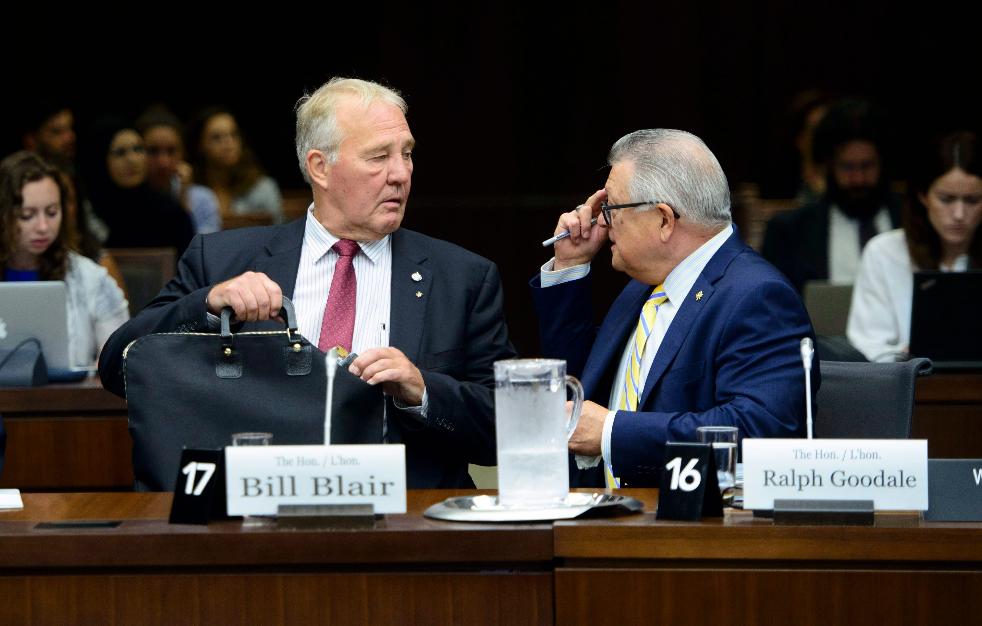 Public Safety and Emergency Preparedness Minister Ralph Goodale and Minister of Border Security and Organized Crime Reduction Bill Blair appear as witnesses at a House of Commons standing committee on immigration in Ottawa on Tuesday, July 24, 2018. (THE CANADIAN PRESS/Sean Kilpatrick)