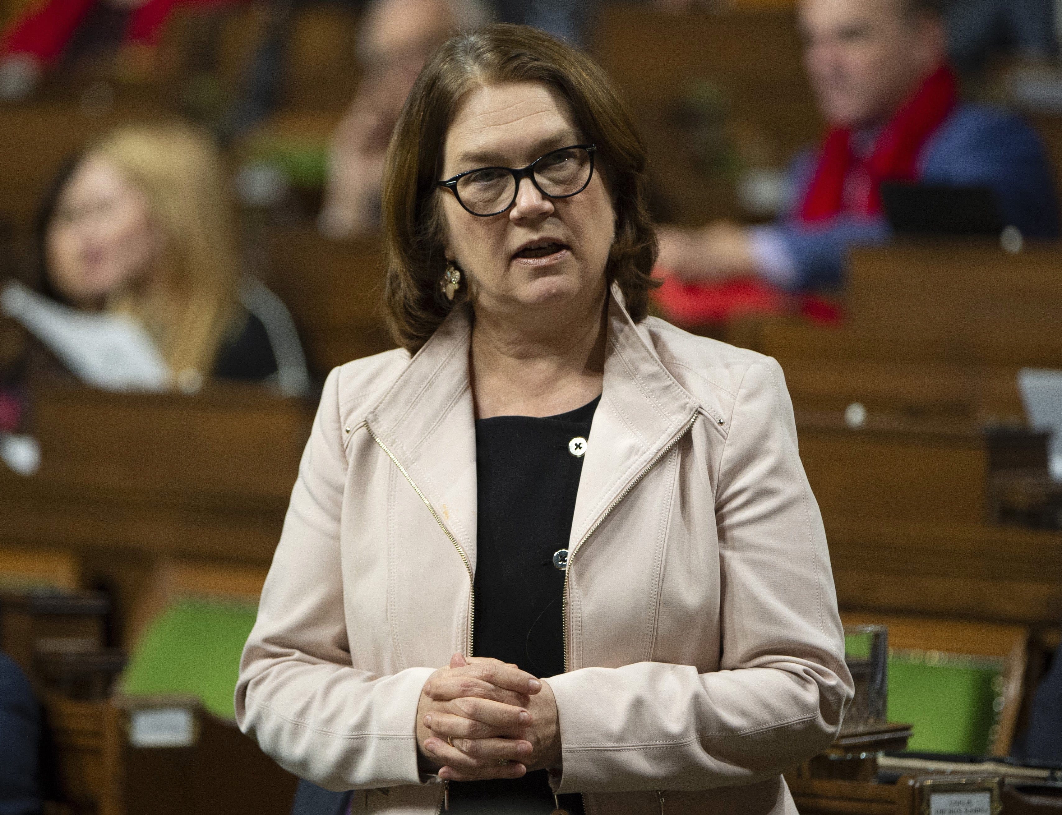 Treasury Board President Jane Philpott rises in the House of Commons to pay tribute to the late auditor general Michael Ferguson, Monday, February 4, 2019 in Ottawa. Philpott has resigned from cabinet. THE CANADIAN PRESS/Adrian Wyld