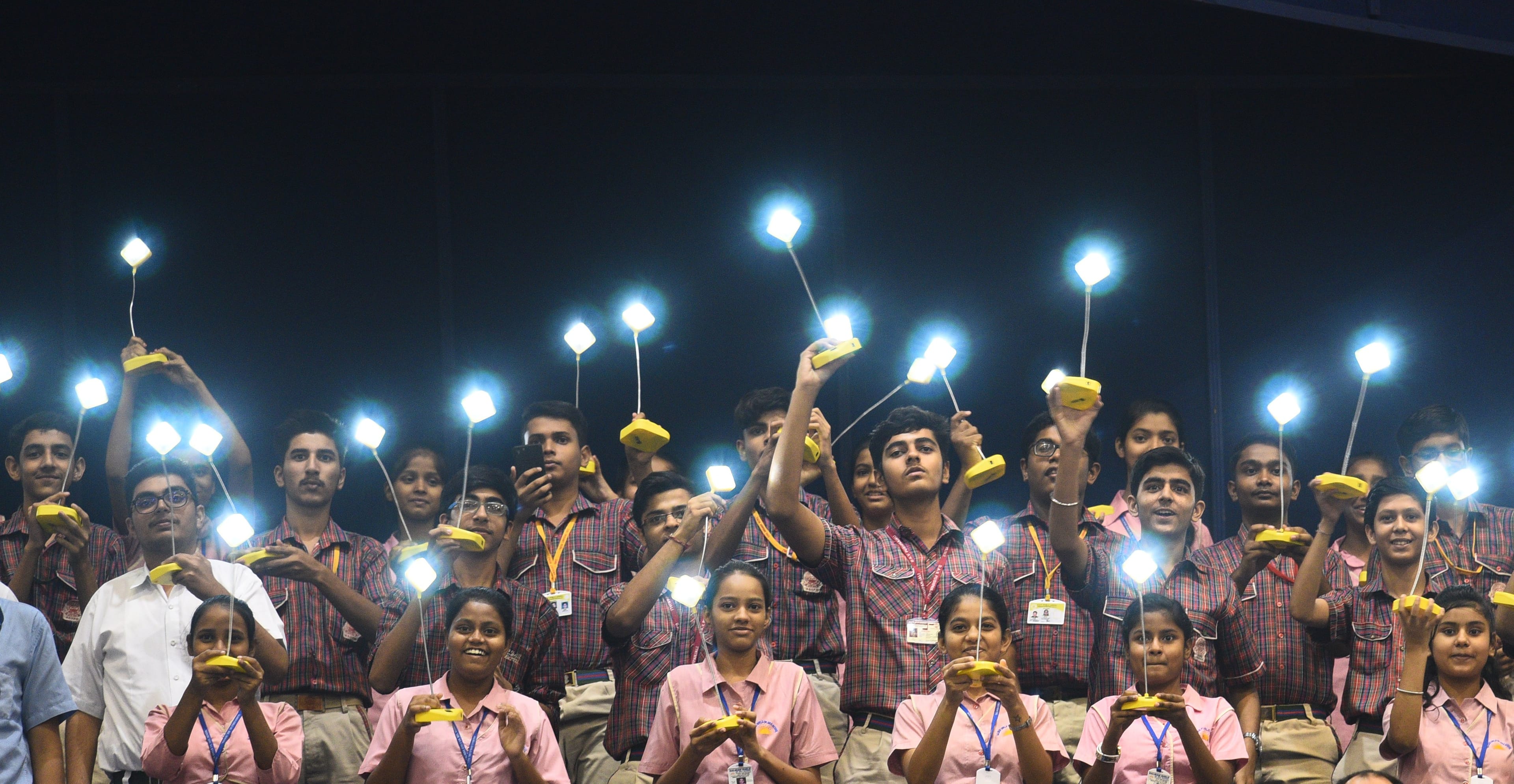 Students display solar lamps during the inauguration of 1st Assembly of International Alliance (ISA), 2nd IORA Renewable Energy Ministerial Meet & 2nd Global RE-Invest 2018, at Vigyan Bhavan, on October 2, 2018 in New Delhi, India. (Photo by Vipin Kumar/Hindustan Times via Getty Images)