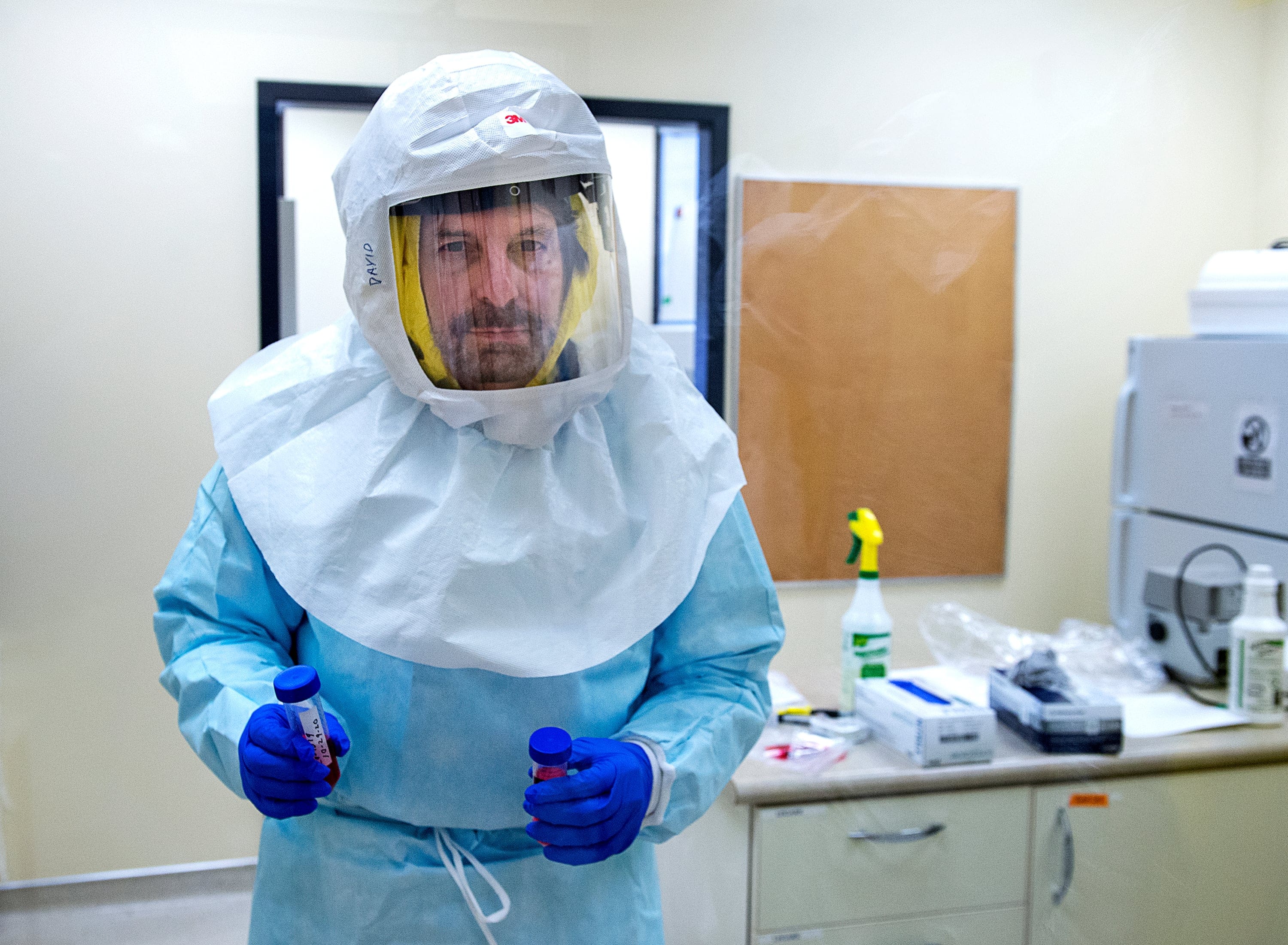 Dr. David Kelvin, a professor in the Faculty of Medicine at Dalhousie University, works in a lab in Halifax on Thursday, Oct. 29, 2020 (CP/Andrew Vaughan)