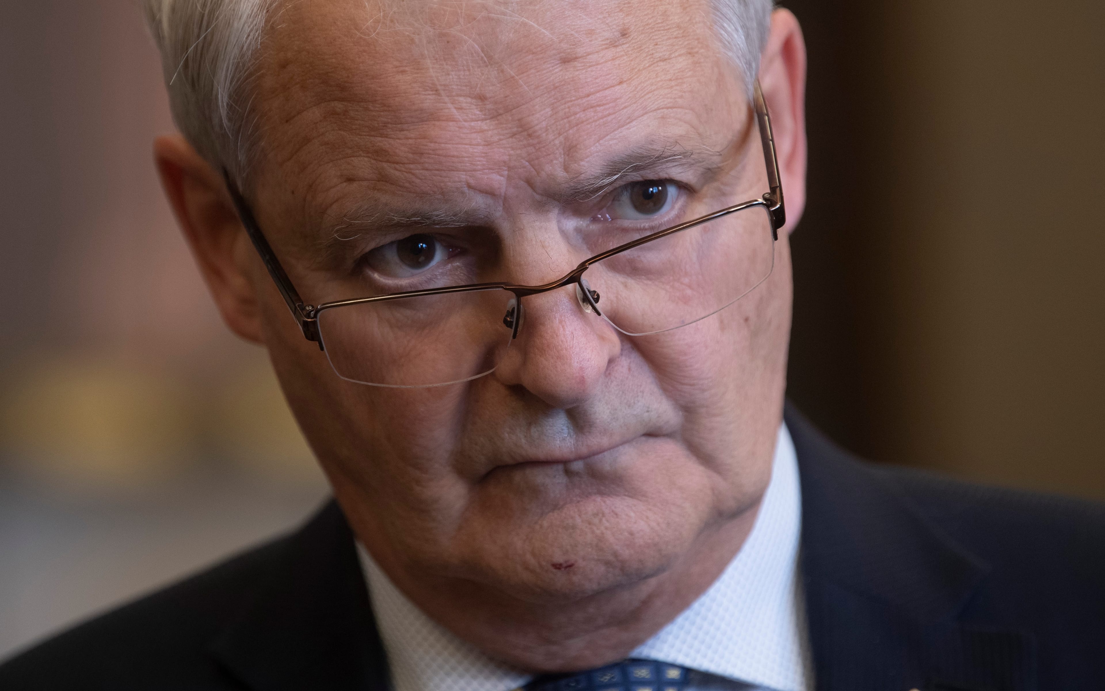 Garneau listens to a reporter's question following an announcement in Ottawa on Feb. 27, 2020 (CP/Adrian Wyld)
