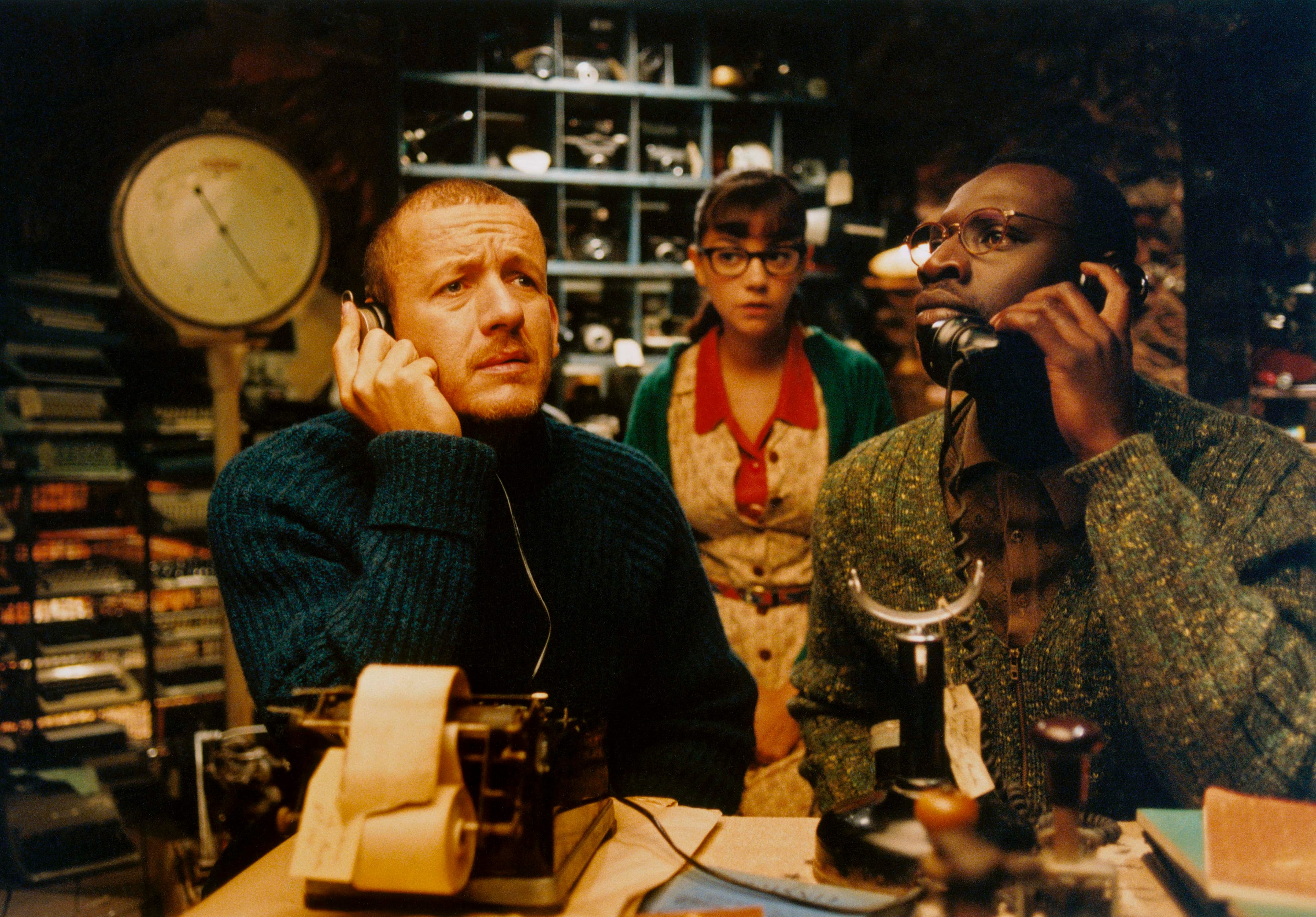 (from left) Dany Boon, Marie-Julie Baup and Omar Sy in 'Micmacs'