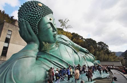 Reclining Buddha Dusting