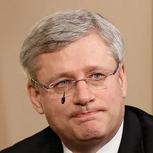 Canada's PM Harper delivers a statement during a photo opportunity in Ottawa