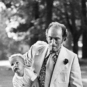 Pierre Trudeau is saluted by RCMP Officer as he carries son Justin to Rideau Hall in 1973 to attend an outdoor reception for visiting heads of the Commonwealth countries in Ottawa.(Peter Bregg/CP)