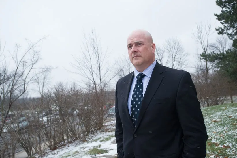 RCMP Sgt. Peter Merrifield arrives at the Newmarket, Ont., courthouse in 2015 where he challenged the RCMP on allegations of workplace harassment. (Photograph by Cole Garside)