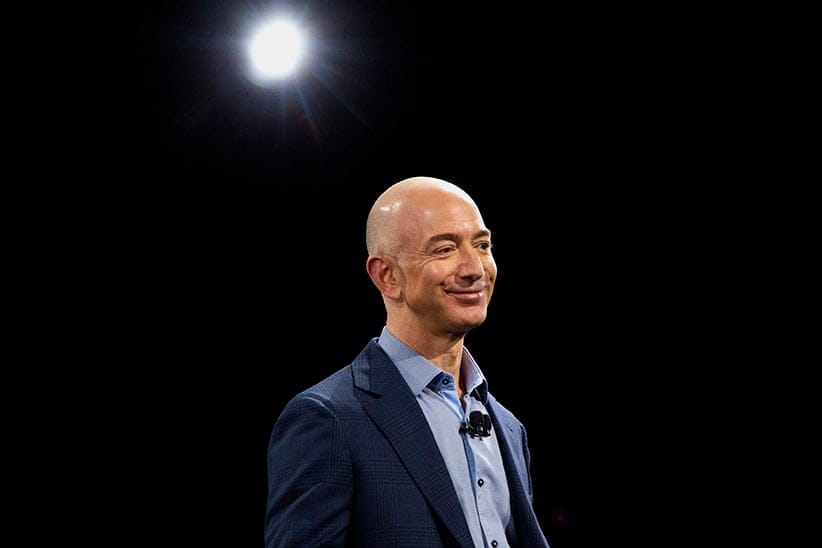 Jeff Bezos, chief executive officer of Amazon.com Inc., speaks after unveiling the Fire Phone during an event at Fremont Studios in Seattle, Washington, U.S., on Wednesday, June 18, 2014. Amazon.com Inc. jumped into the crowded smartphone market with its own handset called Fire Phone, ramping up competition with Apple Inc. and Samsung Electronics Co. (Mike Kane/Bloomberg/Getty Images)
