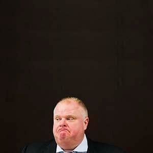 Toronto Mayor Rob Ford sits at a city council executive committee meeting at City Hall in Toronto, May 28, 2013. Two top aides quit Ford's office on Monday as the embattled leader of Canada's biggest city faces lingering allegations he was caught smoking crack cocaine on video, accusations he has firmly denied. The departures of the mayor's press secretary and deputy press secretary came just days after Ford fired his chief of staff. The mayor confirmed on Monday that both George Christopoulos and Isaac Ransom left of their own accord. (Mark Blinch/Reuters)