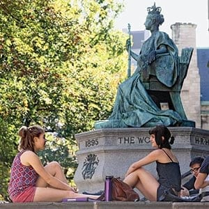 Students sit outside at McGill University in Montreal. (Photograph by Roger LeMoyne)