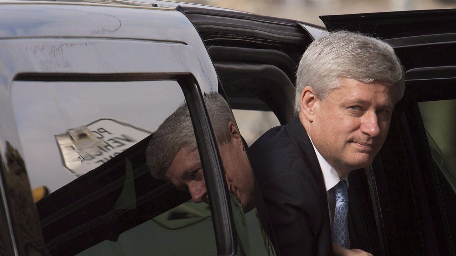 Outgoing prime minister Stephen Harper arrives at his Langevin office in Ottawa, Wednesday, Oct. 21, 2015. On his final day as prime minister, Harper reached out to a public service which his government had a tense relationship with for the last nine years.In a message sent to the entire government bureaucracy, he thanks them for the support they've shown his team over three successive Parliaments and for their dedication to the well-being of Canadians. (Adrian Wyld/CP)