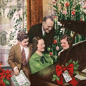 Idealized American couple with their two children, singing Christmas carols around the piano and Christmas tree on Christmas Day, 1937. Screen print from a hand-colored photograph. (GraphicaArtis/Getty Images)