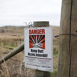 A warning sign on the Goose Lake Range in Vernon B.C. , October 27, 2015. Many unexploded explosive ordnance are still on the range which is owned by the Okanagan Indian Band Reserve. (Photograph by Jason Franson)