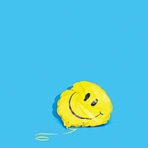 Deflated smiley face balloon. (Photograph by Daniel Ehrenworth)