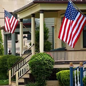 Flags outside American homes. (Istock)