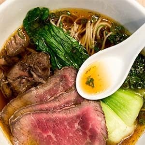WASHINGTON, DC - DECEMBER 1: Momofuku Beef Noodle Soup short rib, baby bok choy and black pepper at Momofuku. (Dixie D. Vereen/The Washington Post/Getty Images)