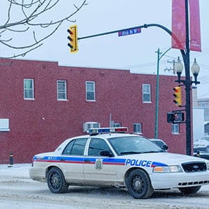 Saskatoon Police patrol 20th Street and Avenue D in the Riversdale neighbourhood of Saskatoon. (Photograph by Derek Mortensen)