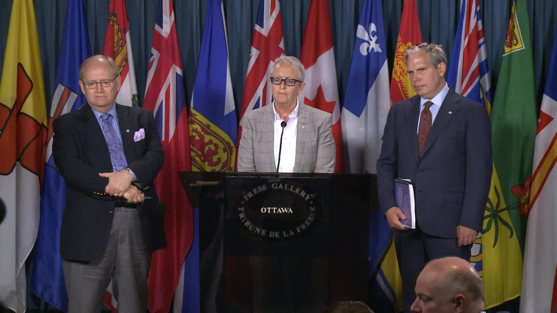 Egale executive director, Helen Kennedy (centre), releases the report Grossly Indecent with constitutional lawyer Douglas Elliott (left) and Todd Ross, who was given an honourable discharge from the army in the 80s for being gay.