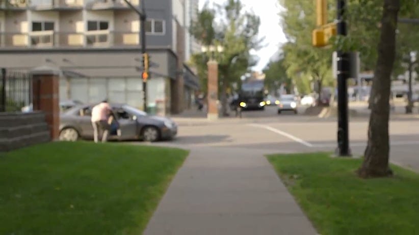 Edmonton actor Jesse Lipscombe confronts a man in a car who called out racial slurs while Lipscombe was filming a video.
(CP Video)