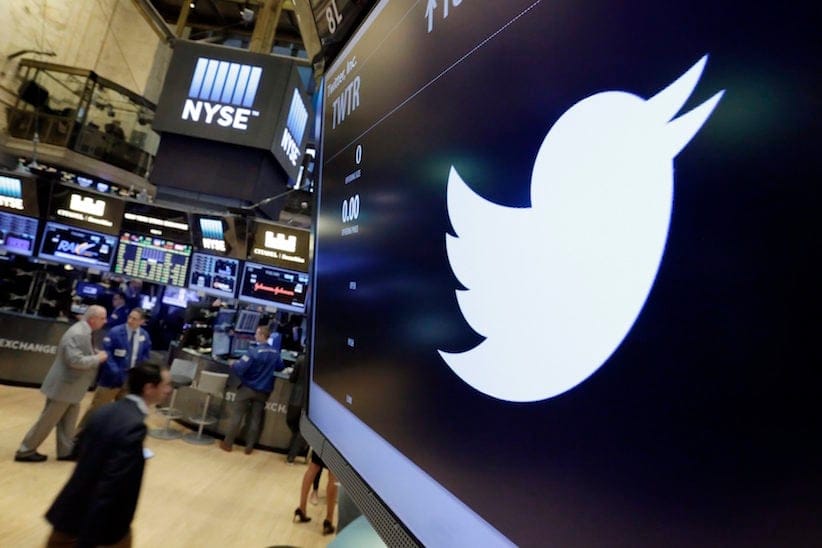 In this July 27, 2016, file photo, the Twitter symbol appears above a trading post on the floor of the New York Stock Exchange. (AP Photo/Richard Drew, File)
