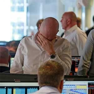 Traders from BGC, a global brokerage company in London's Canary Wharf financial centre react during trading June 24, 2016 after Britain voted to leave the European Union in the EU BREXIT referendum. (Russell Boyce/Reutres)