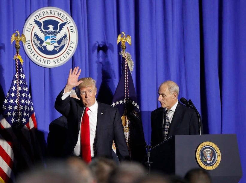 President Donald Trump, followed by Homeland Security Secretary John F. Kelly, waves as he steps off stage after speaking at the Homeland Security Department in Washington, Wednesday, Jan. 25, 2017. (AP Photo/Pablo Martinez Monsivais)